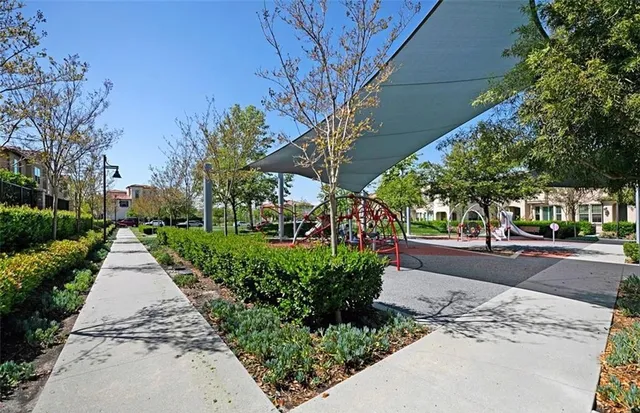 a view of a street with a bench
