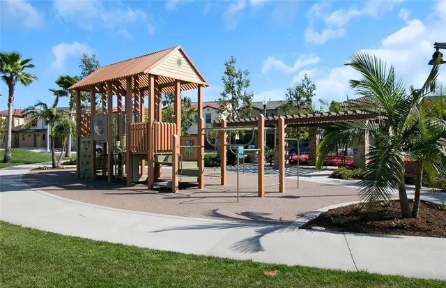a view of a house with backyard and porch