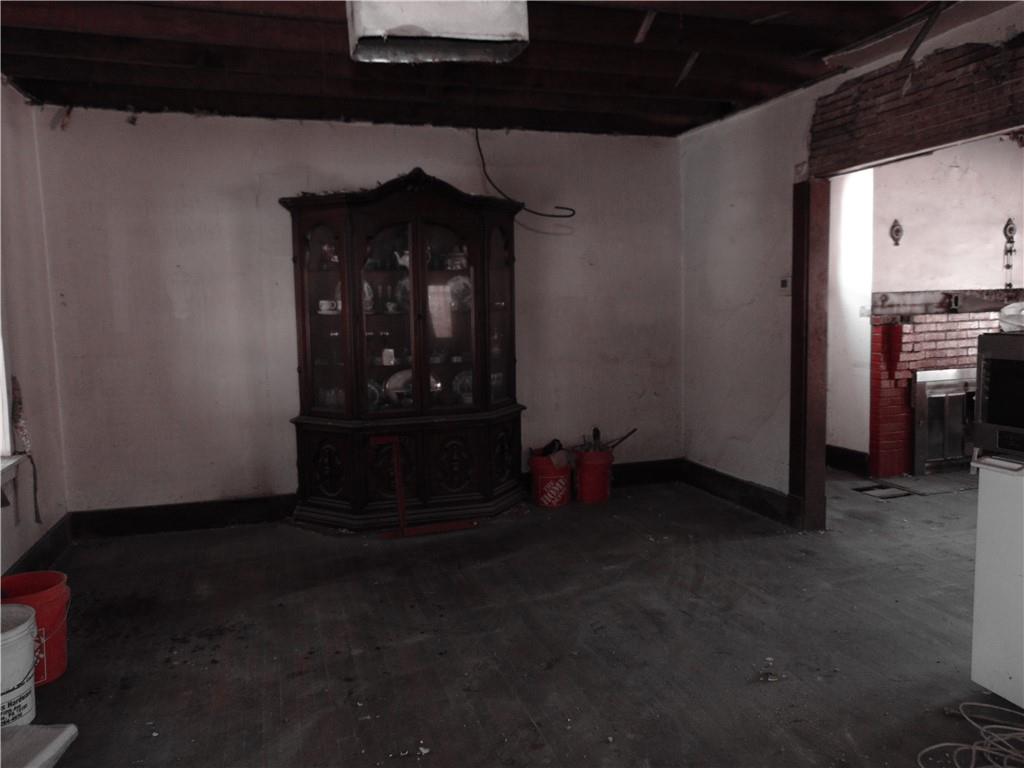 808 Wood Street Coraopolis, PA 15108 - Photo 4 of 11 a living room with a fireplace