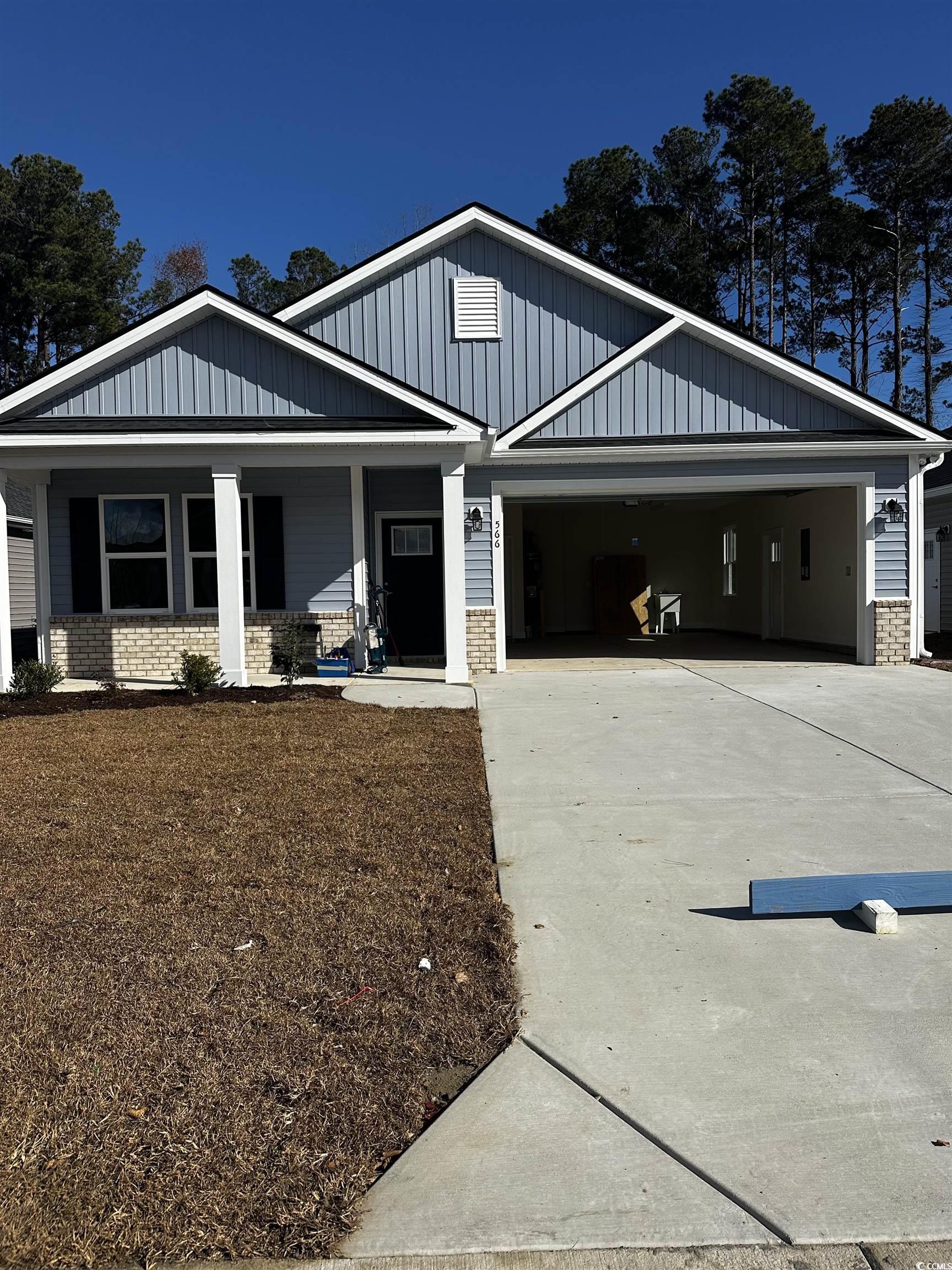 566 Beckham Court Murrells Inlet, SC 29576 - Photo 1 of 36 Craftsman-style home featuring covered porch and a