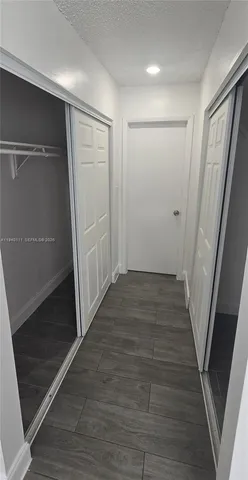 a bathroom with a toilet a sink and bathtub