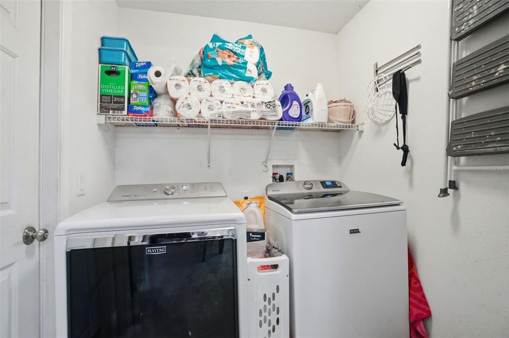 15396 Fleetwood Road Weeki Wachee, FL 34614 - Photo 34 of 66 a utility room with washer and dryer