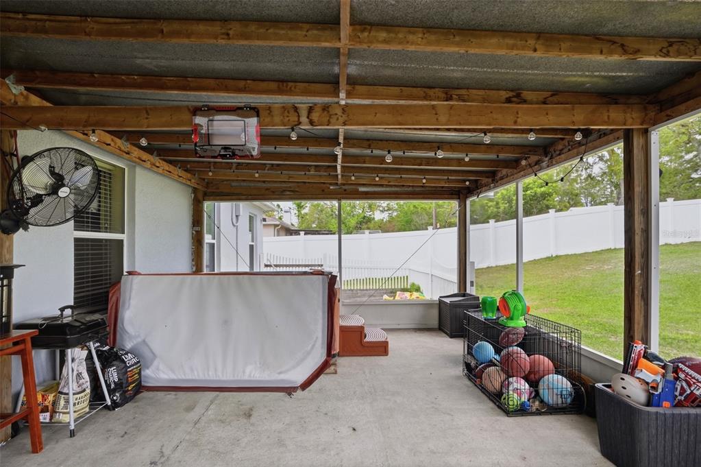 15396 Fleetwood Road Weeki Wachee, FL 34614 - Photo 39 of 66 a room with lots of potted plants