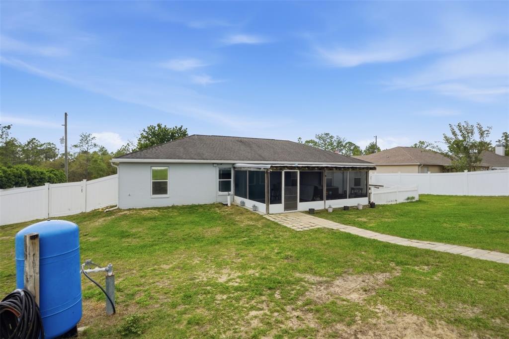 15396 Fleetwood Road Weeki Wachee, FL 34614 - Photo 48 of 66 a house view with a garden space