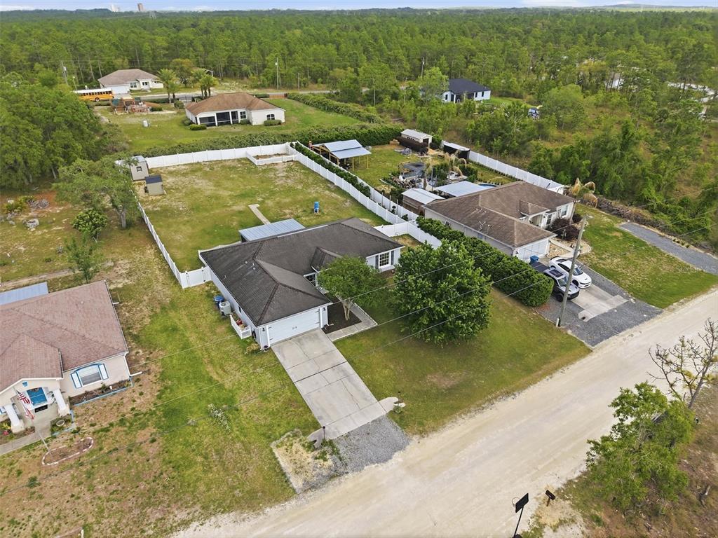 15396 Fleetwood Road Weeki Wachee, FL 34614 - Photo 56 of 66 an aerial view of residential houses with outdoor space