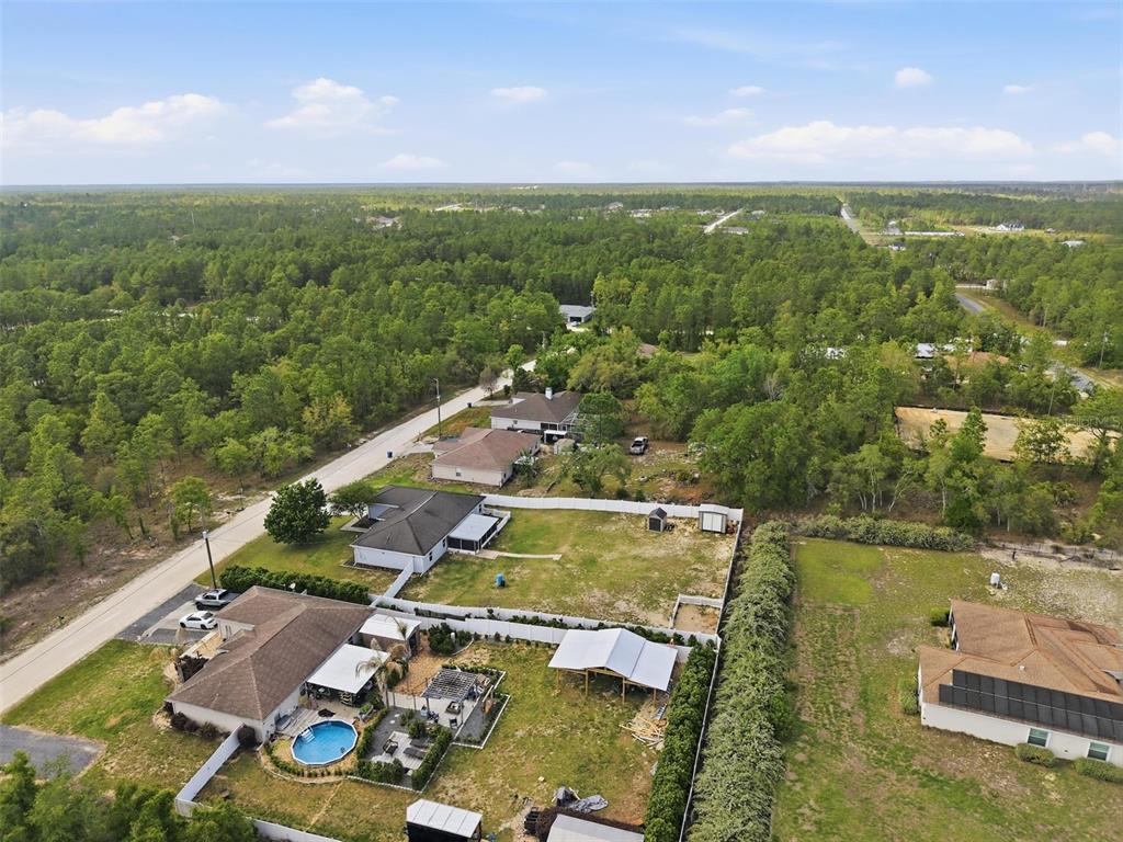 15396 Fleetwood Road Weeki Wachee, FL 34614 - Photo 60 of 66 an aerial view of residential houses with outdoor space