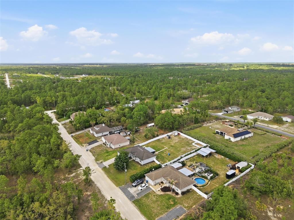 15396 Fleetwood Road Weeki Wachee, FL 34614 - Photo 61 of 66 an aerial view of residential houses with outdoor space