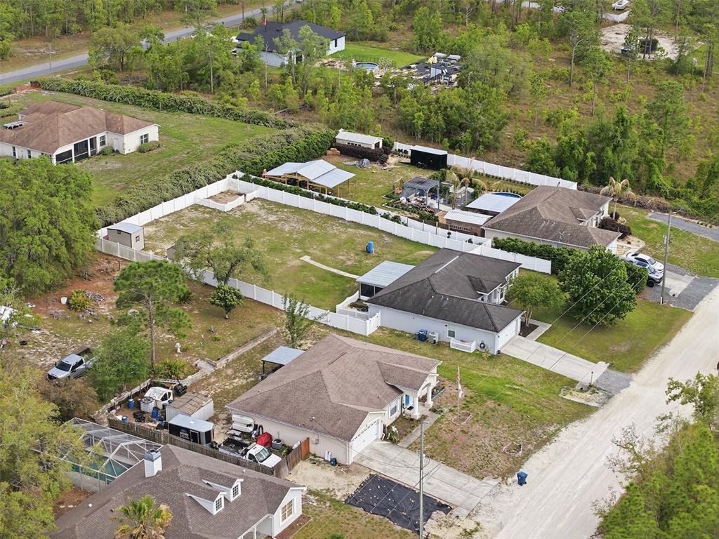 15396 Fleetwood Road Weeki Wachee, FL 34614 - Photo 65 of 66 an aerial view of a house with a yard