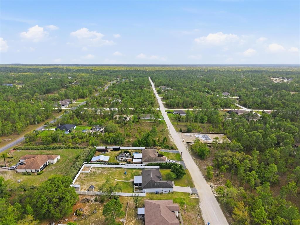 15396 Fleetwood Road Weeki Wachee, FL 34614 - Photo 66 of 66 an aerial view of residential houses with outdoor space and entertaining space
