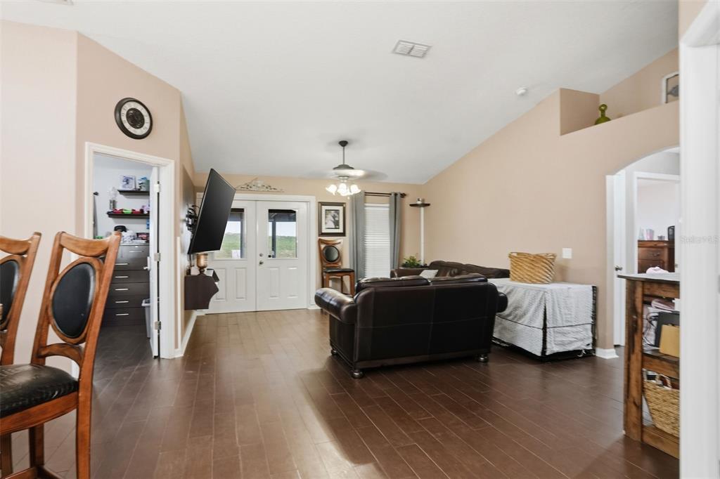 15396 Fleetwood Road Weeki Wachee, FL 34614 - Photo 7 of 66 a living room with furniture and a flat screen tv