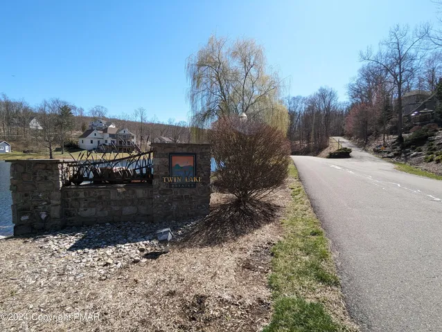 a view of a backyard of the house