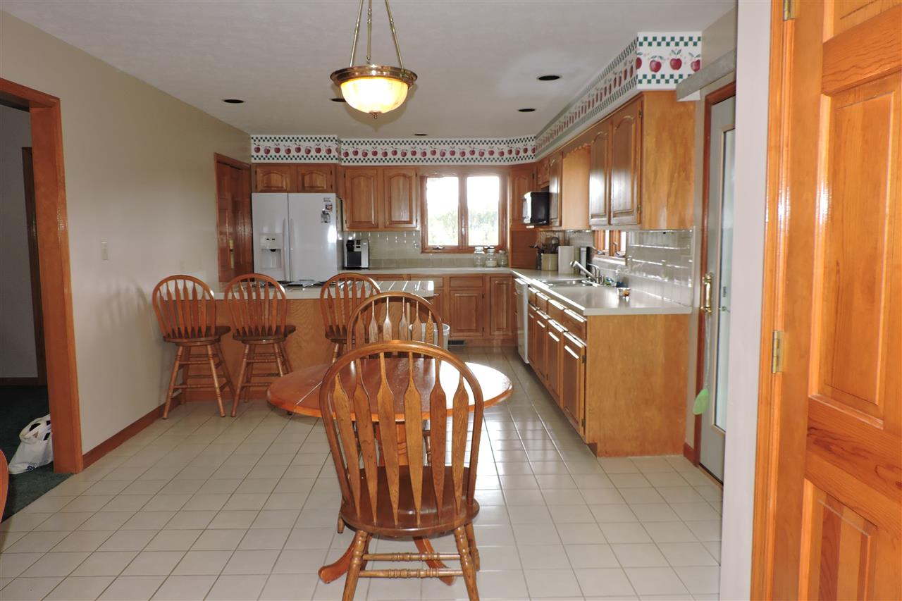 266 McKinley Road Middlebrook, VA 24459 - Photo 18 of 28 a view of a dining room with furniture and chandelier