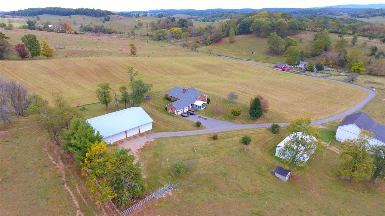266 McKinley Road Middlebrook, VA 24459 - Photo 2 of 28 a view of a lake in front of house