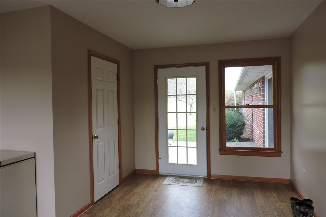 266 McKinley Road Middlebrook, VA 24459 - Photo 21 of 28 an empty room with wooden floor and windows