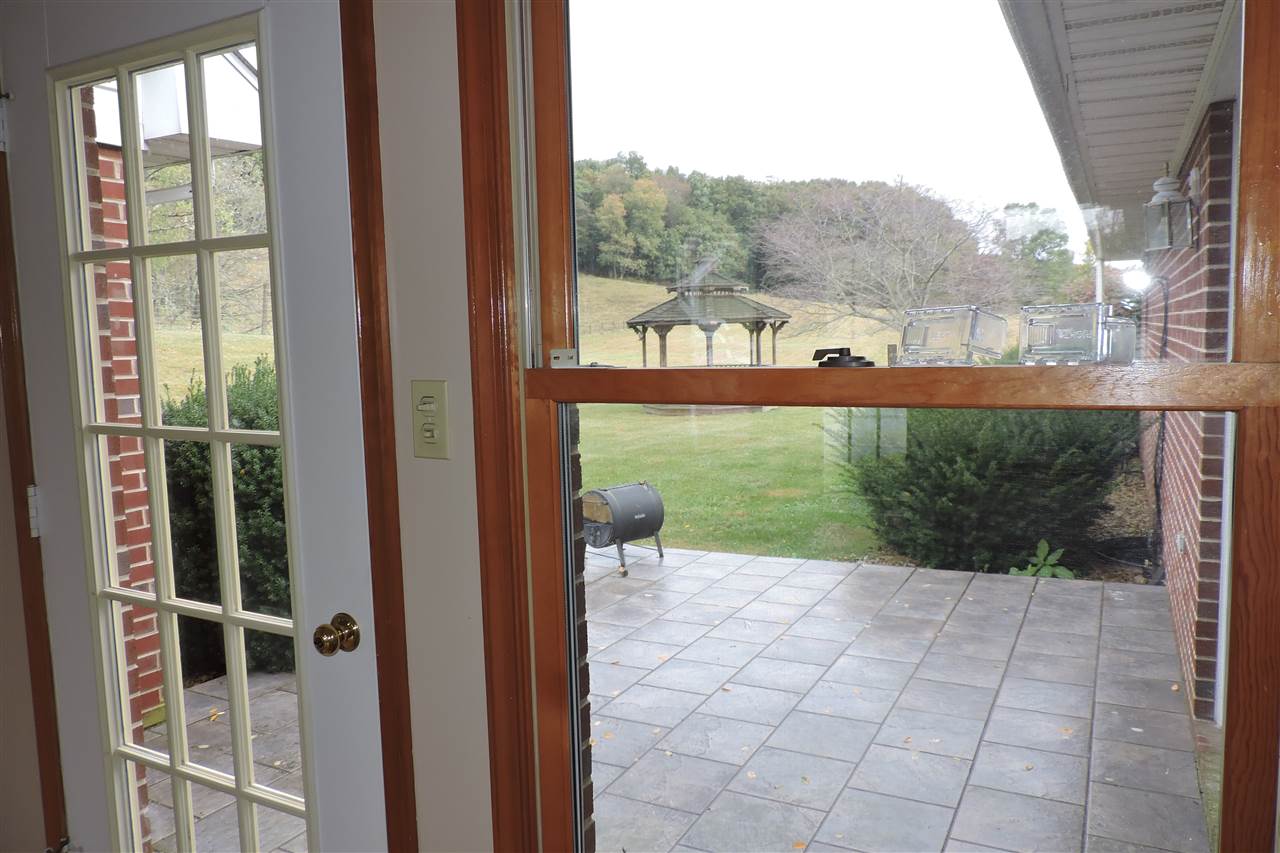 266 McKinley Road Middlebrook, VA 24459 - Photo 22 of 28 a view of a balcony with mountain view and a garden