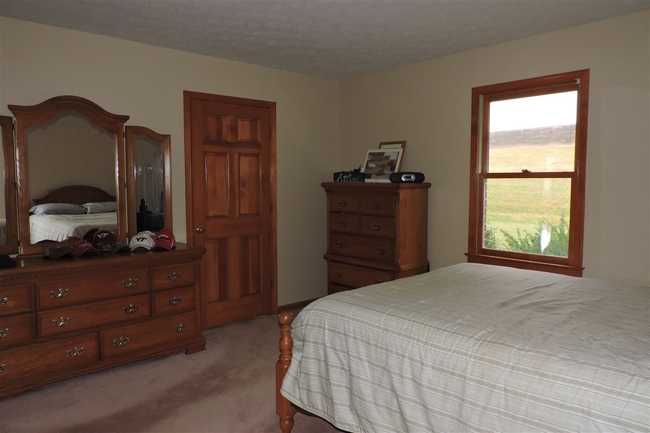 266 McKinley Road Middlebrook, VA 24459 - Photo 27 of 28 a bedroom with a bed and a dresser