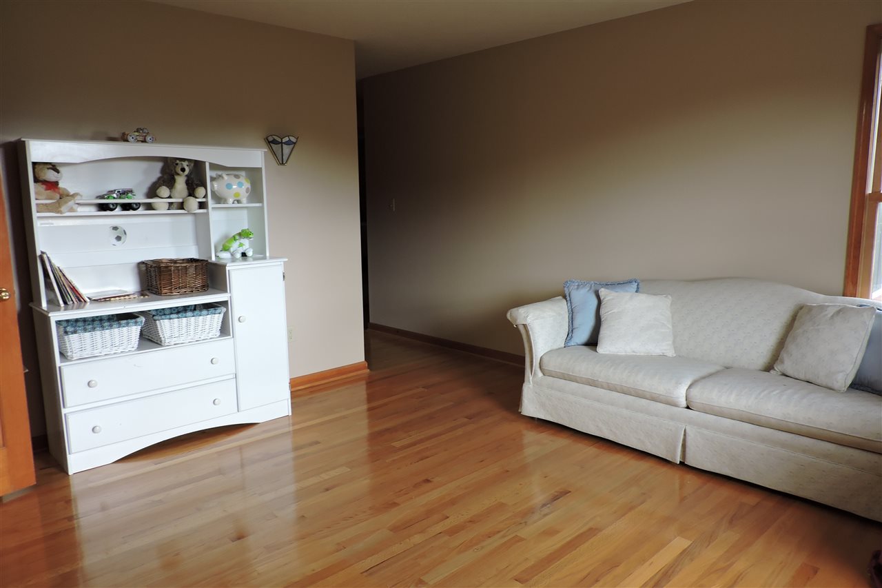 266 McKinley Road Middlebrook, VA 24459 - Photo 28 of 28 a living room with furniture and a wooden floor