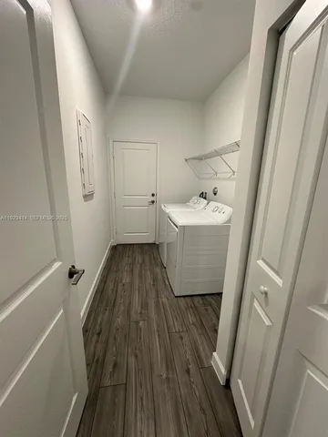 a bathroom with a sink a bathtub and toilet
