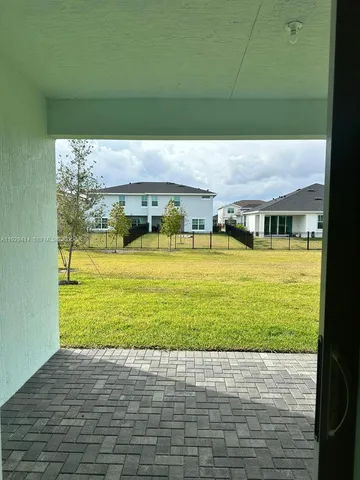 a view of a swimming pool with an outdoor space