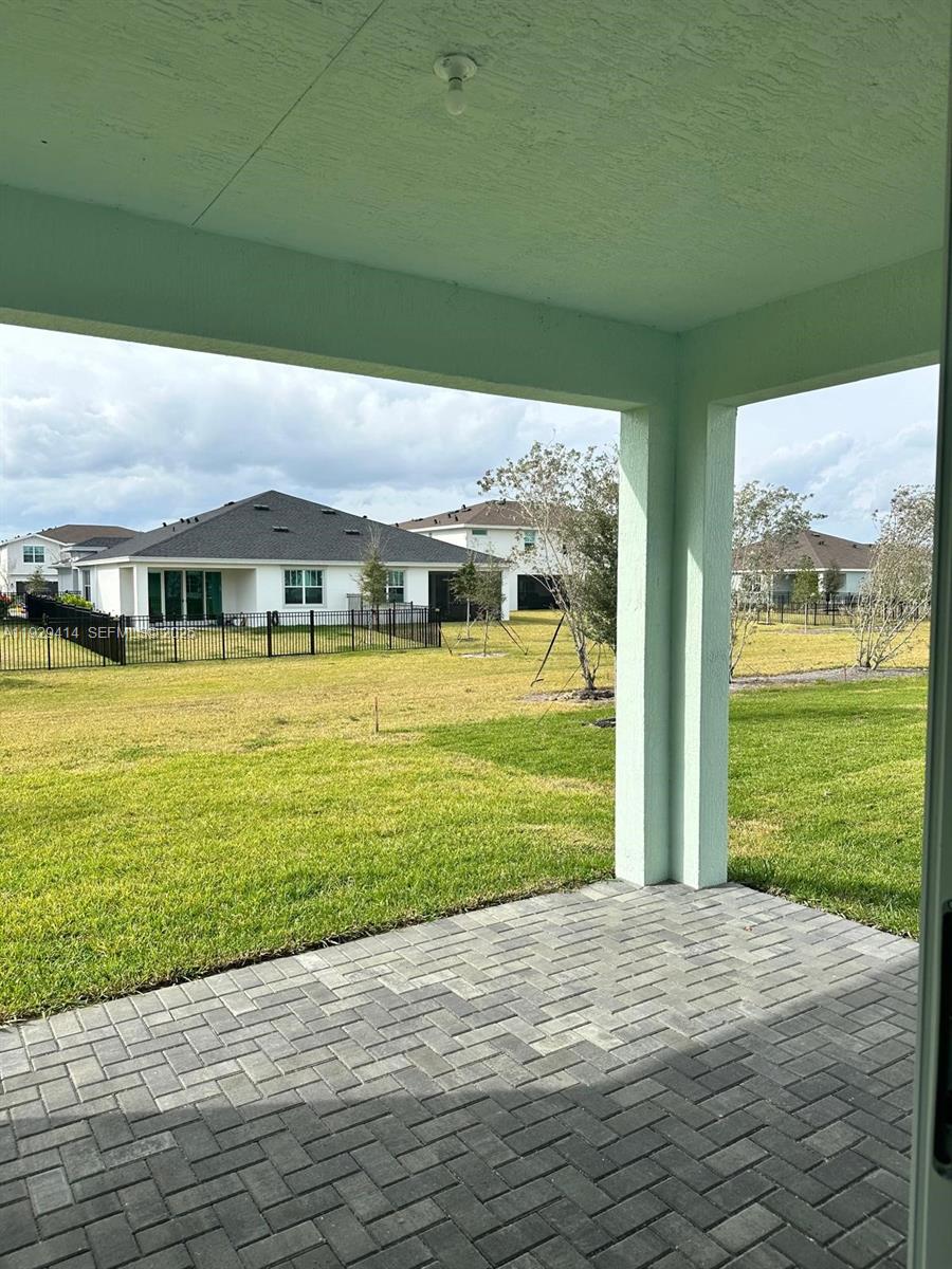 1443 Tangled Orchard Trace, Unit 1443 Loxahatchee, FL 33470 - Photo 33 of 33 a view of a house with a ocean view