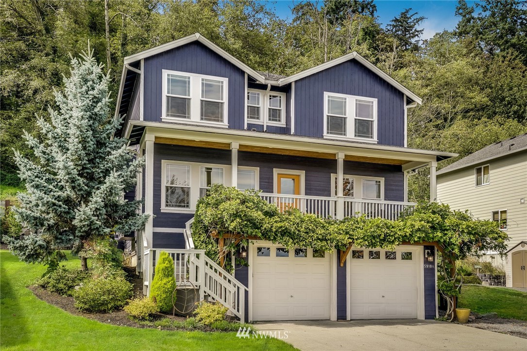 5910 Larimer Road, Unit A Everett, WA 98208 - Photo 24 of 24 a front view of a house with a yard garage and outdoor seating