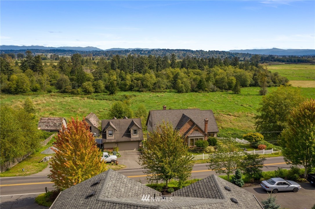 5910 Larimer Road, Unit A Everett, WA 98208 - Photo 4 of 24 a view of a garden with an ocean