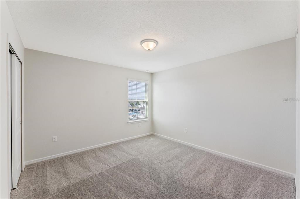 2326 Vision Street Davenport, FL 33896 - Photo 11 of 29 a view of an empty room with a window