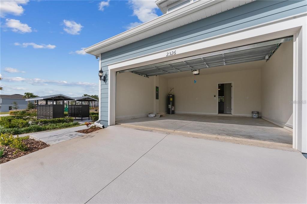 2326 Vision Street Davenport, FL 33896 - Photo 25 of 29 a view of a house with a flat space porch