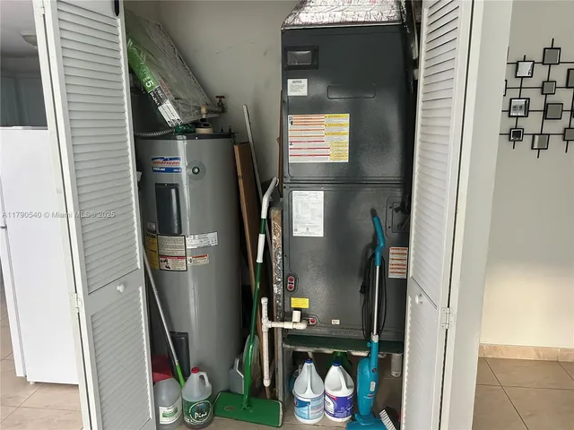 a view of a hallway with closet