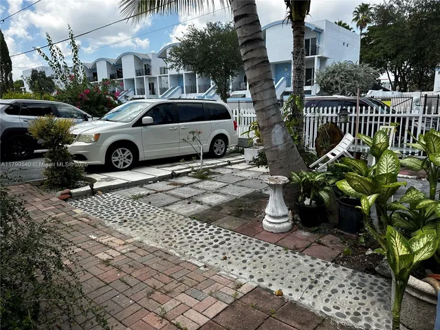 a view of a potted flower in a park