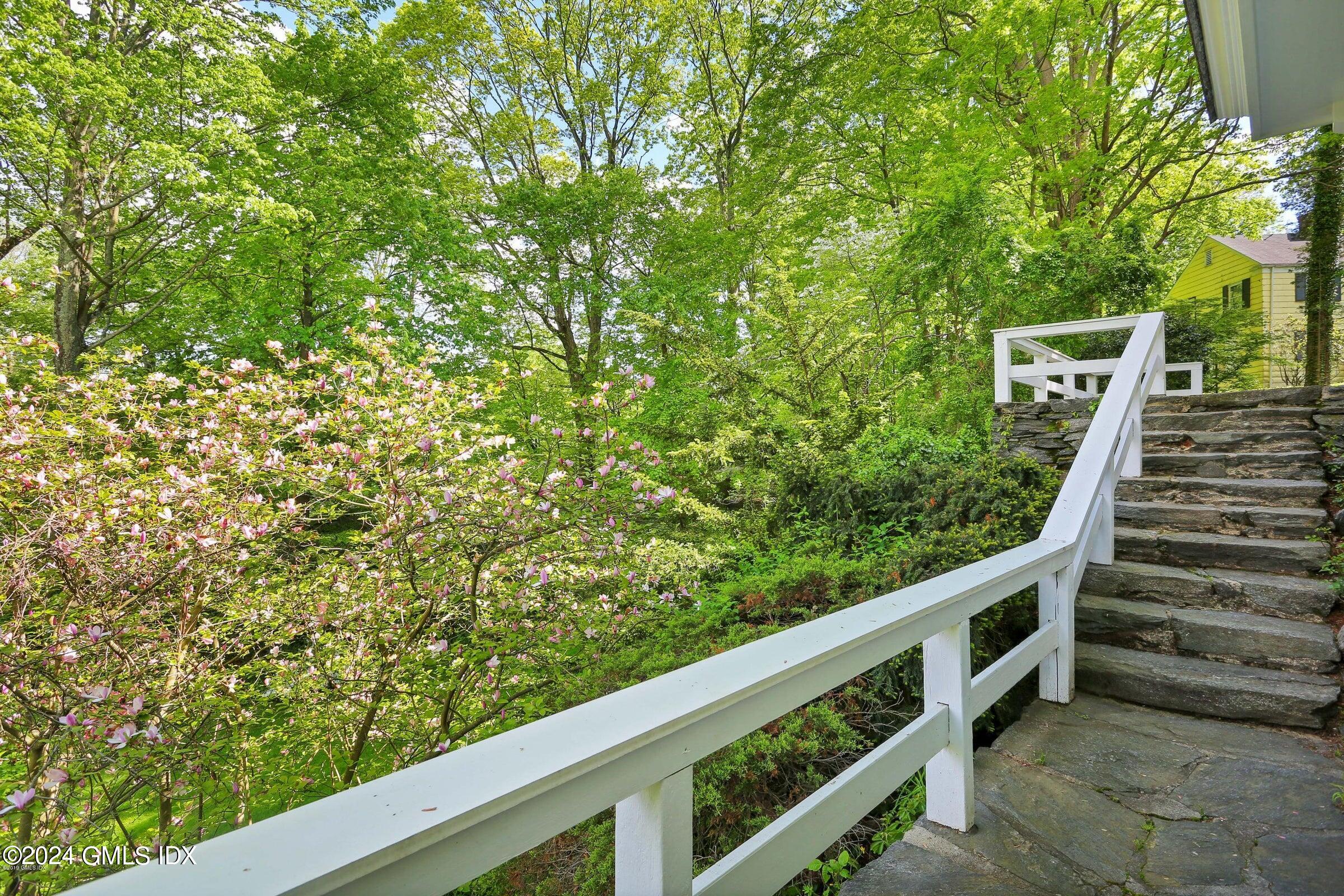 20 Martin Dale Greenwich, CT 06830 - Photo 16 of 25 a view of a wooden fence and trees