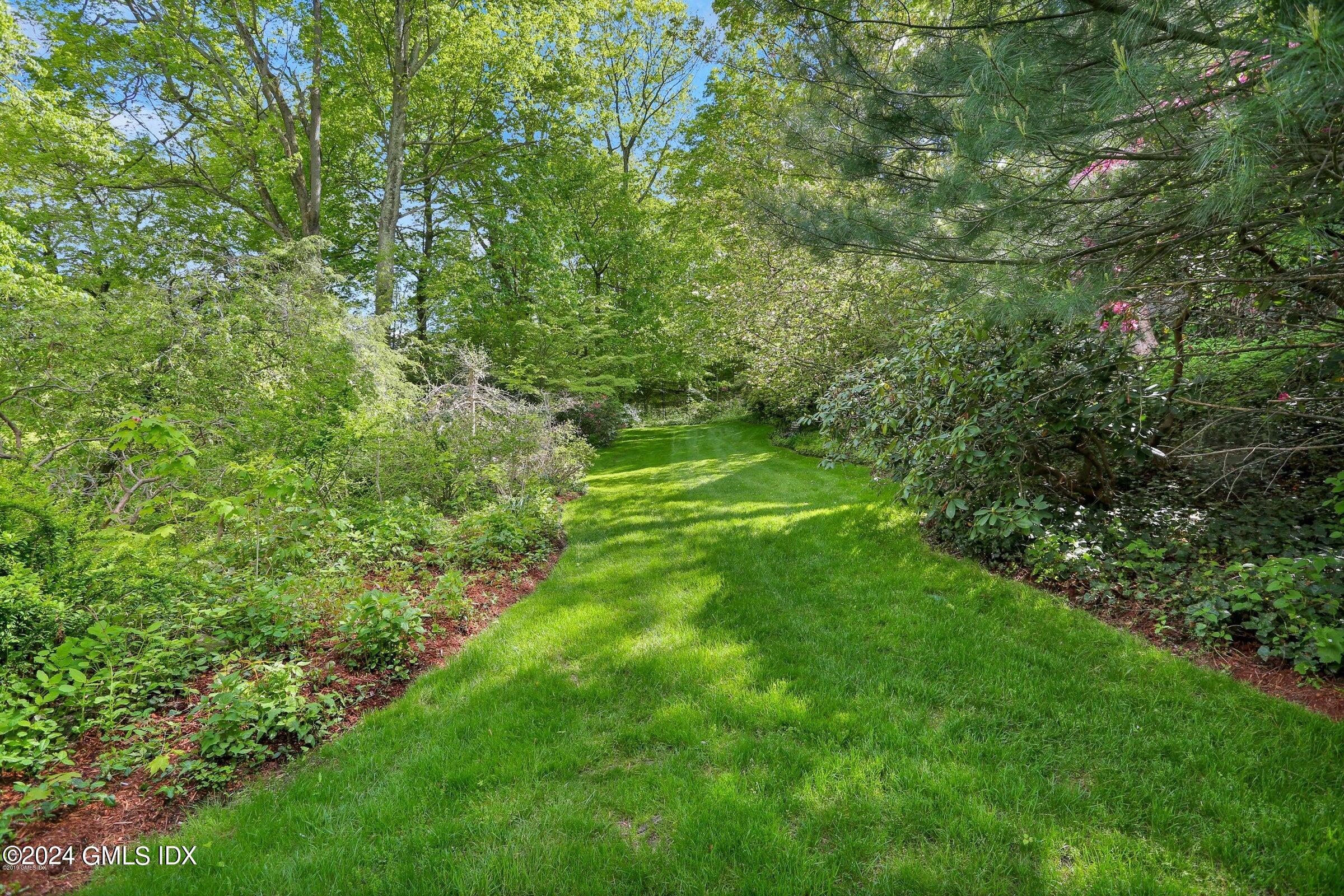 20 Martin Dale Greenwich, CT 06830 - Photo 18 of 25 a view of a lush green space