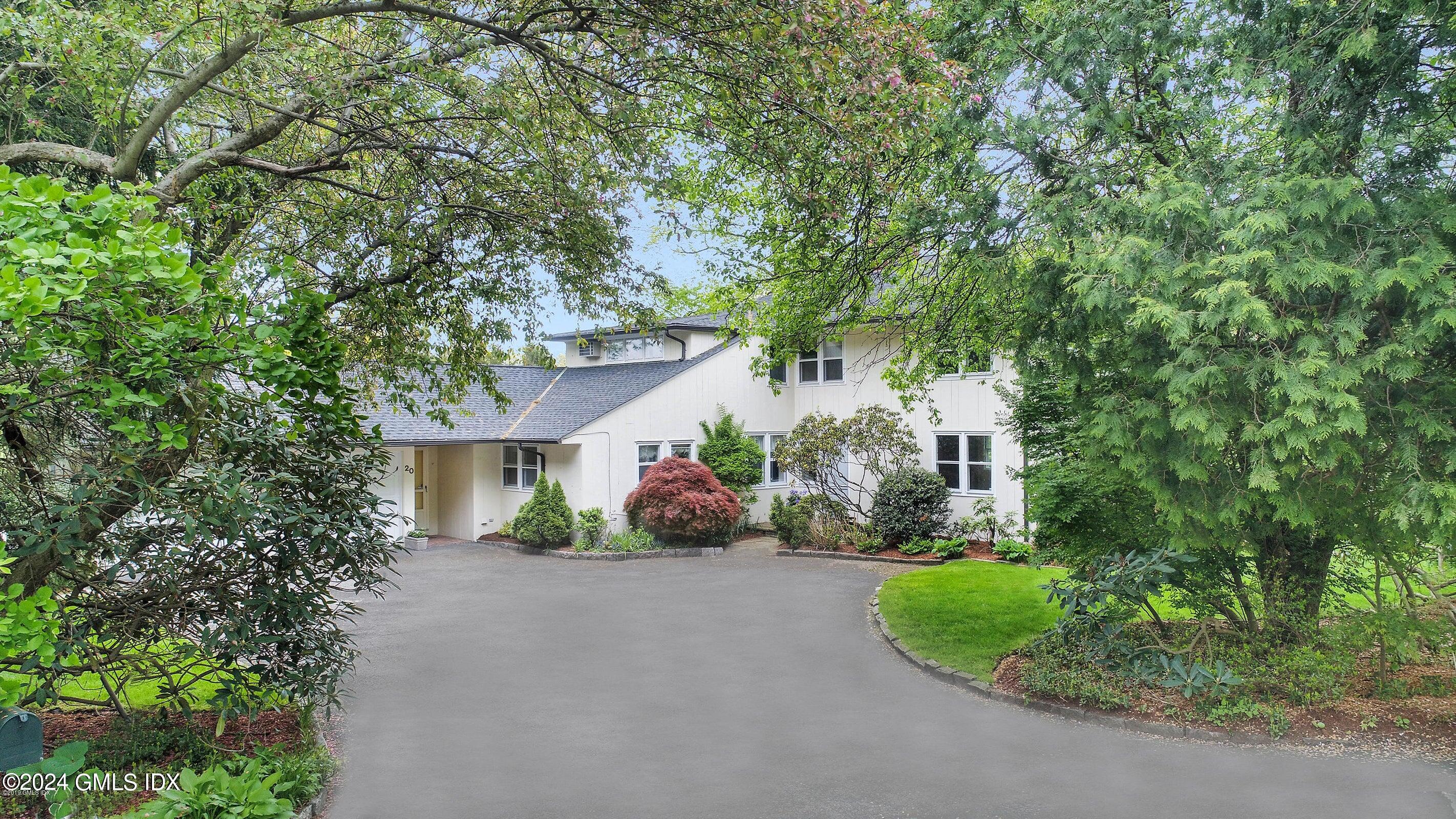20 Martin Dale Greenwich, CT 06830 - Photo 22 of 25 front view of a house with a street