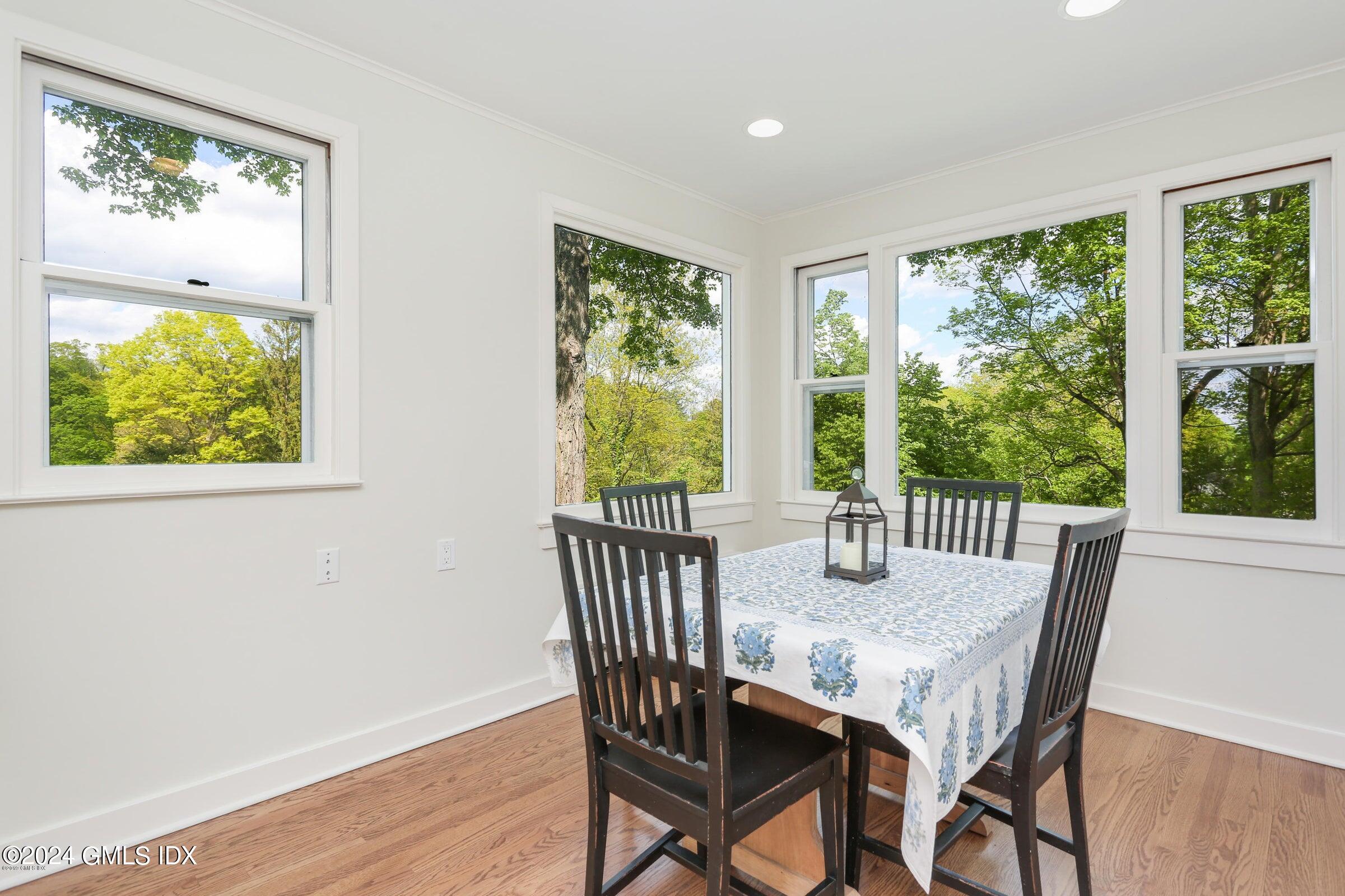 20 Martin Dale Greenwich, CT 06830 - Photo 7 of 25 a view of a dining room with furniture window and wooden floor