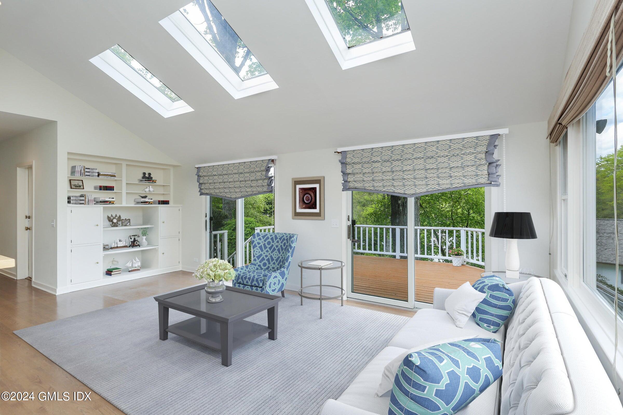 20 Martin Dale Greenwich, CT 06830 - Photo 9 of 25 a living room with furniture and a large window