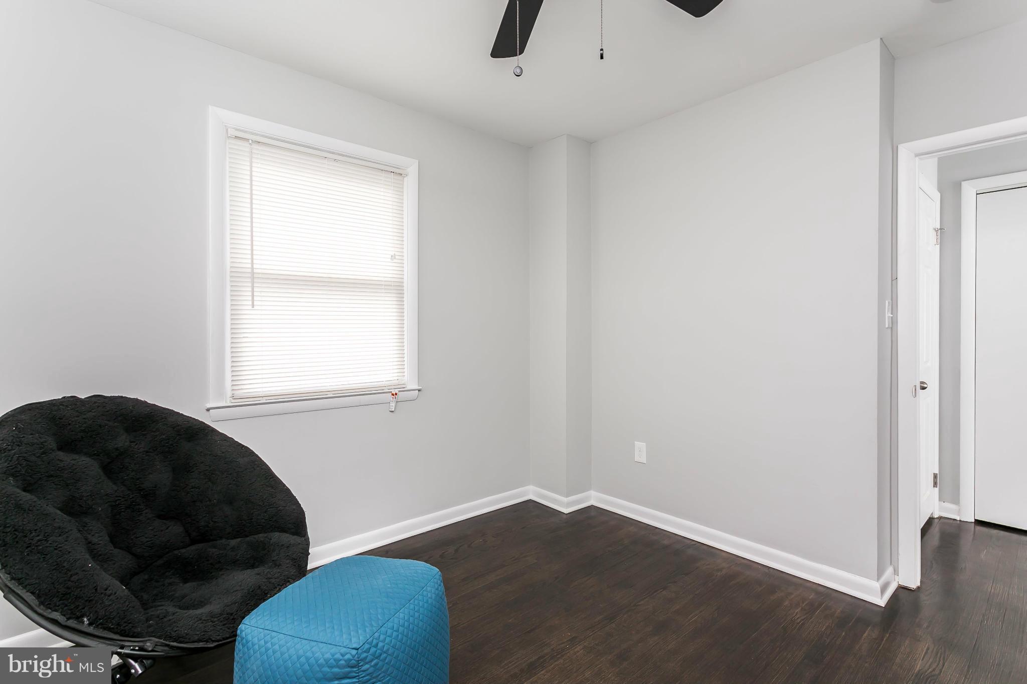 755 Fulbrook Road Baltimore, MD 21222 - Photo 14 of 29 a living room with furniture and a window
