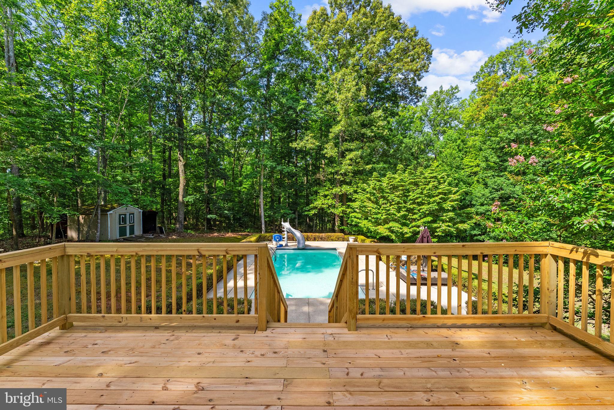 20065 Crooked Run Road Culpeper, VA 22701 - Photo 48 of 62 a view of deck with two chairs and wooden fence