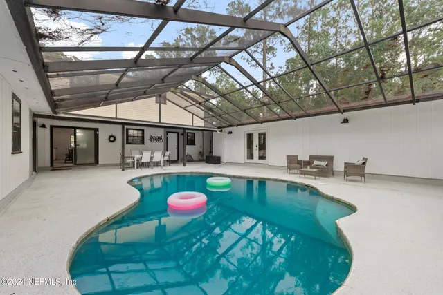 a view of a garden with an outdoor space