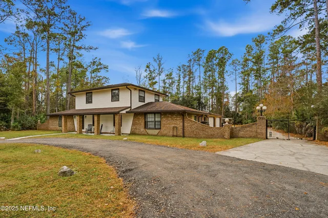 a living room with furniture flat screen tv and a fireplace