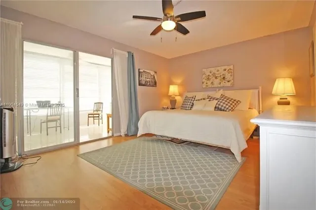 a bedroom with a bed and a cabinets