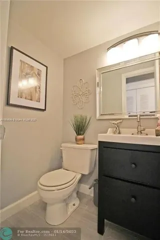 a bathroom with a toilet and shower