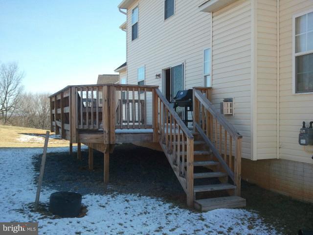 84 Boise Road Inwood, WV 25428 - Photo 22 of 30 a view of a roof deck with chairs