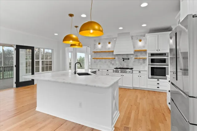 a kitchen with sink and window