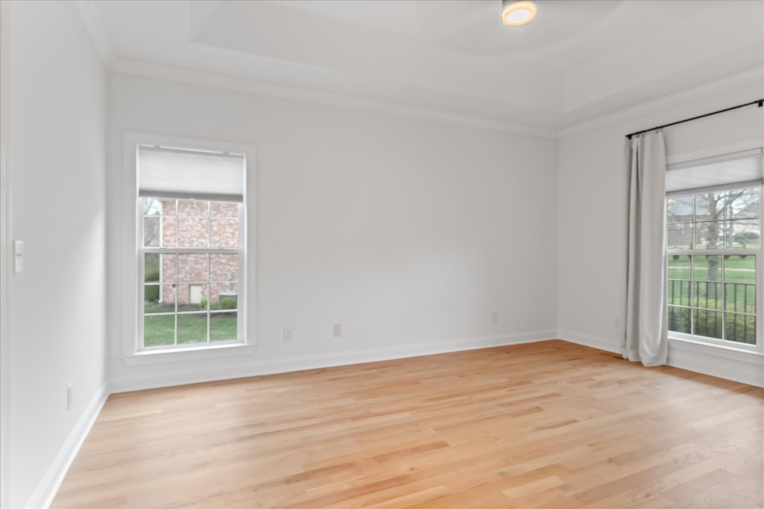 5004 Paint Creek Court Spring Hill, TN 37174 - Photo 39 of 91 a view of an empty room with wooden floor and a window