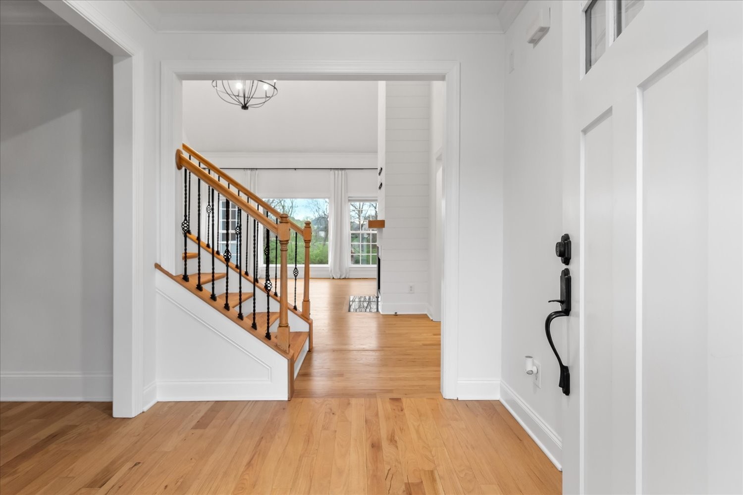 5004 Paint Creek Court Spring Hill, TN 37174 - Photo 4 of 91 a view of a hallway with wooden floor and staircase