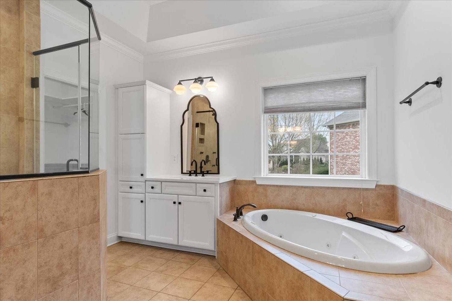 5004 Paint Creek Court Spring Hill, TN 37174 - Photo 44 of 91 a bathroom with a tub a window and a shower