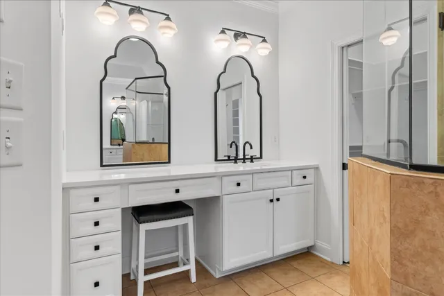 an aerial view of a house with garden space and street view