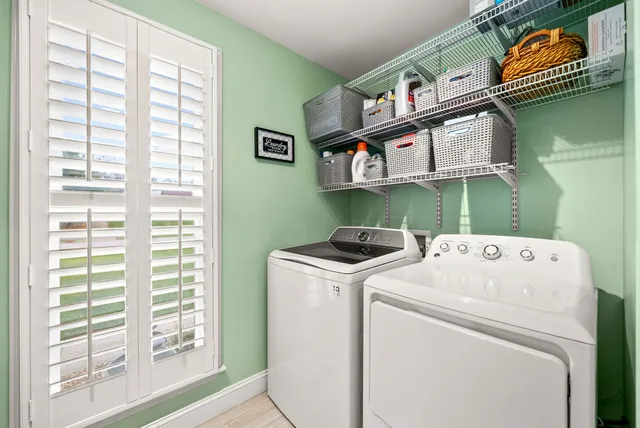 a view of a kitchen from the hallway