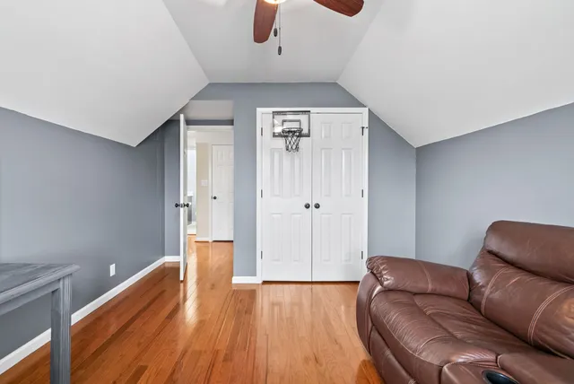 a view of kitchen with furniture wooden floor and window