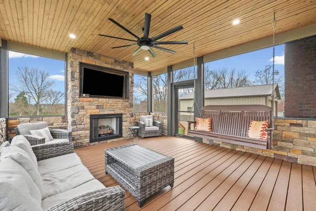 a view of a porch with a big yard